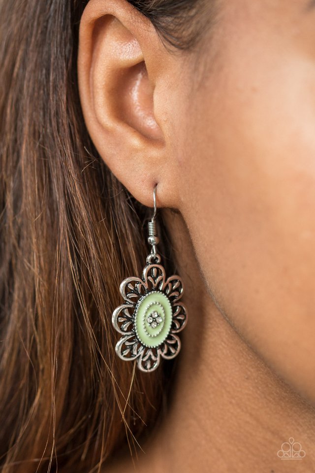 Decorative silver petals bloom from a shiny green center. Dotted in dainty silver beads, the colorful center is encrusted in glassy white rhinestones for a whimsical finish. Earring attaches to a standard fishhook fitting.  Sold as one pair of earrings.   Always nickel and lead free.