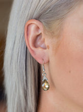 Load image into Gallery viewer, Crowned in glassy white rhinestones, a golden topaz teardrop gem swings from the ear for a glamorous look. Earring attaches to a standard fishhook fitting.  Sold as one pair of earrings.  