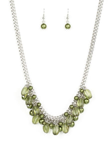 A collection of glassy and pearly green beads dangle from the bottom of interconnected silver chains, creating a flirtatious fringe below the collar. Features an adjustable clasp closure.  Sold as one individual necklace. Includes one pair of matching earrings.