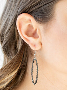 Dainty hematite rhinestones are pressed into a studded oval frame for a timeless look. Earring attaches to a standard fishhook fitting.  Sold as one pair of earrings.  Always nickel and lead free.