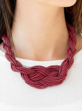 Load image into Gallery viewer, Countless strands of wine red seed beads are twisted and knotted together to create an unforgettable statement piece. Features an adjustable clasp closure.  Sold as one individual necklace. Includes one pair of matching earrings.  Always nickel and lead free.