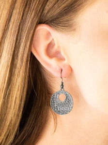   Embossed in tactile textures, a shimmery gunmetal frame swings from the ear for an edgy look. Earring attaches to a standard fishhook fitting.  Sold as one pair of earrings. 