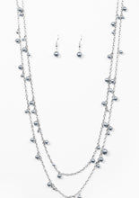 Load image into Gallery viewer, Varying in size, classic silver pearls cascade along shimmery silver chains, creating a glamorous fringe. Features an adjustable clasp closure. Sold as one individual necklace. Includes one pair of matching earrings.