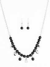 Load image into Gallery viewer, Shimmery silver heart charms, silver beads, and polished black beads swing from a row of matching black beads, creating a whimsical fringe below the collar. Featuring a regal teardrop shape, a glittery white rhinestone swings from the center for a refined finish. Features an adjustable clasp closure.  Sold as one individual necklace. Includes one pair of matching earrings.