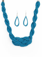 Load image into Gallery viewer, Countless strands of blue seed beads are twisted and knotted together to create an unforgettable statement piece. Features an adjustable clasp closure. Sold as one individual necklace. Includes one pair of matching earrings.