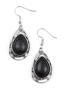 Chiseled into a tranquil teardrop, an earthy black stone is pressed into the center of a twisting silver frame for a handcrafted look. Earring attaches to a standard fishhook fitting.  Sold as one pair of earrings.