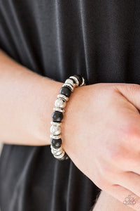 A collection of silver accents and earthy black stones are threaded along a stretchy band for a seasonal look. Sold as one individual bracelet. Always nickel and lead free.