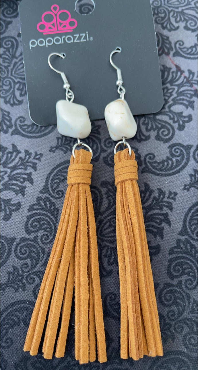 Natural earthy earrings, soft brown suede tassels hang from a polished white sandstone. 3.5