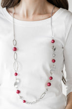 Load image into Gallery viewer, Oversized red pearls, ornate silver beads, and an array of glistening silver accents trickle along a lengthened silver chain for a refined look. Features an adjustable clasp closure.  Sold as one individual necklace. Includes one pair of matching earrings.  Always nickel and lead free.