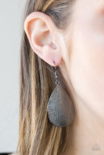 Load image into Gallery viewer, Etched in shimmery scratch textures, a bold gunmetal teardrop swings from the ear for a seasonal look. Earring attaches to a standard fishhook fitting.  Sold as one pair of earrings.  Always nickel and lead free.