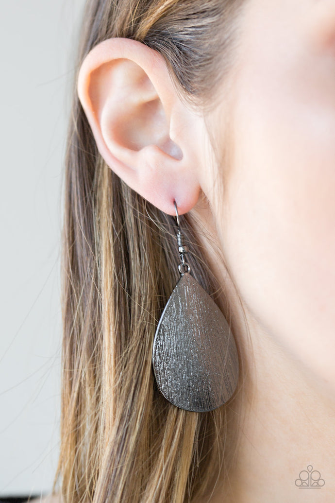 Etched in shimmery scratch textures, a bold gunmetal teardrop swings from the ear for a seasonal look. Earring attaches to a standard fishhook fitting.  Sold as one pair of earrings.  Always nickel and lead free.