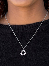 Load image into Gallery viewer, Dainty silver hearts and glittery white rhinestones join into a round dainty pendant below the collar for a romantic look. Features an adjustable clasp closure.  Sold as one individual necklace. Includes one pair of matching earrings.