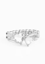 Load image into Gallery viewer, Infused with dainty white rhinestone encrusted silver bands, white heart-shape rhinestones delicately come together at the center of the finger. Features a dainty stretchy band for a flexible fit.  Sold as one individual ring.