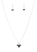 Load image into Gallery viewer, Faceted beads and a glassy black gem swing from the bottom of a shimmery silver chain, creating a dainty pendant below the collar. Features an adjustable clasp closure.  Sold as one individual necklace. Includes one pair of matching earrings.