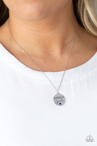 Dotted with a dainty blue rhinestone, a shimmery disc is stamped in the phrase, "American girl", for a whimsical look below the collar. Features an adjustable clasp closure.  Sold as one individual necklace. Includes one pair of matching earrings.  Always nickel and lead free.