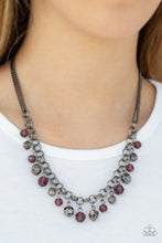 Load image into Gallery viewer, A collection of faceted gunmetal beads and purple crystal-like beads swing from the bottom of a double-link gunmetal chain, creating a blinding fringe below the collar. Features an adjustable clasp closure.  Sold as one individual necklace. Includes one pair of matching earrings.  Always nickel and lead free.