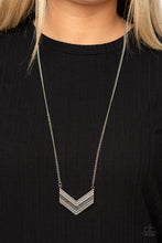 Load image into Gallery viewer, Ribbed in linear texture, the center of a stacked silver chevron-like pendant is encrusted in a row of smoky hematite rhinestones for a glitzy finish. Features an adjustable clasp closure.  Sold as one individual necklace. Includes one pair of matching earrings.  Always nickel and lead free.