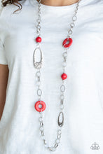 Load image into Gallery viewer,   A compilation of fiery red stone beads, silver rings, and hammered silver accents connect across the chest for an artisan flair. Features an adjustable clasp closure.  Sold as one individual necklace. Includes one pair of matching earrings. Always nickel and lead free.