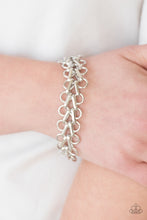 Load image into Gallery viewer, Bold silver frames link across the wrist for a fierce industrial look. Features an adjustable clasp closure.  Sold as one individual bracelet.  Always nickel and lead free.