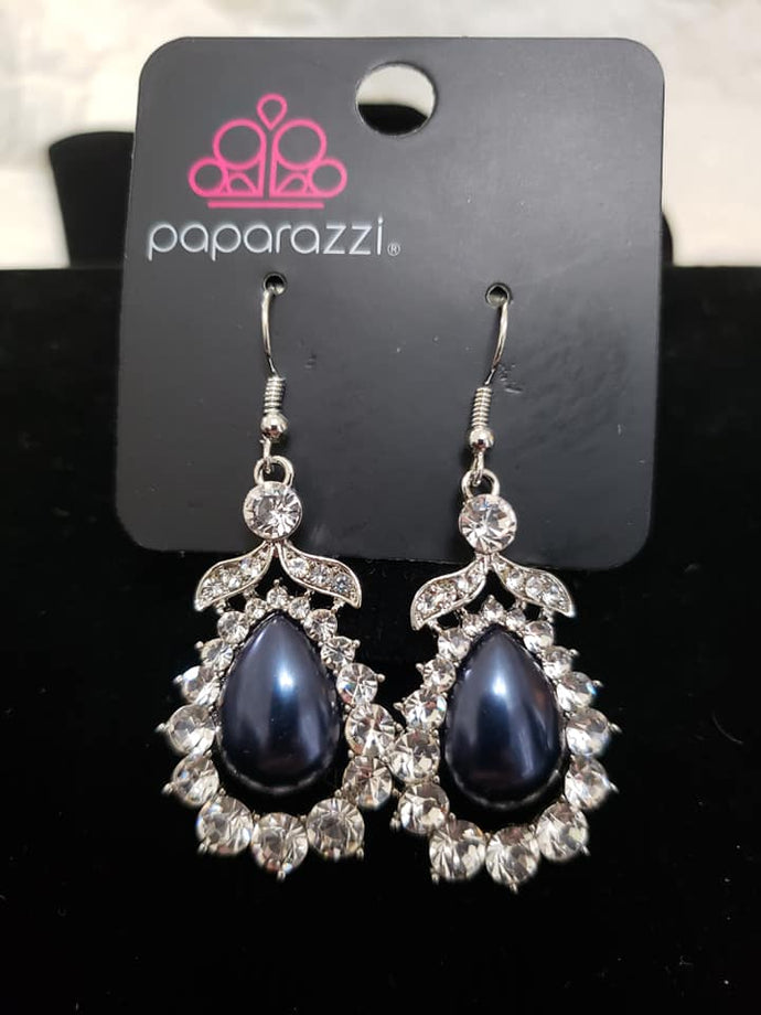 A pearly navy blue bead is pressed into the center of an ornate silver teardrop frame radiating with glassy white rhinestones for a regal look. Earring attaches to a standard fishhook fitting.  Sold as one pair of earrings.  Always nickel and lead free.  Exclusive!!