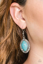 Load image into Gallery viewer, A refreshing turquoise stone is pressed into the center of a glistening silver frame radiating with floral and tribal inspired patterns for a seasonal look. Earring attaches to a standard fishhook fitting.  Sold as one pair of earrings.   Always nickel and lead free.