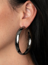 Load image into Gallery viewer, A thick gunmetal bar dramatically curls into an oversized hoop for a classic look. Earring attaches to a standard post fitting. Hoop measures approximately 2 1/2&quot; in diameter.  Sold as one pair of hoop earrings.   Always nickel and lead free.