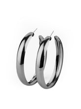 Load image into Gallery viewer, A thick gunmetal bar dramatically curls into an oversized hoop for a classic look. Earring attaches to a standard post fitting. Hoop measures approximately 2 1/2&quot; in diameter.  Sold as one pair of hoop earrings.   Always nickel and lead free.
