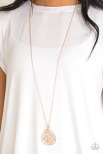 Load image into Gallery viewer, Leafy rose gold branches fan out across a glistening rose gold teardrop frame, creating a whimsical pendant at the bottom of a lengthened rose gold chain. Features an adjustable clasp closure.  Sold as one individual necklace. Includes one pair of matching earrings.  