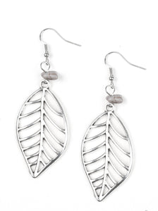 An airy silver leaf swings from the bottom of a refreshing gray pebble, creating a seasonal lure. Earring attaches to a standard fishhook fitting.  Sold as one pair of earrings.