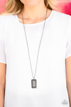 Load image into Gallery viewer, Featuring a regal emerald style cut, a faceted hematite rhinestone is pressed into the center of a glistening gunmetal frame bordered by dainty hematite rhinestones. The dramatic pendant swings from the bottom of a lengthened gunmetal chain for an edgy look. Features an adjustable clasp closure.  Sold as one individual necklace. Includes one pair of matching earrings.  Always nickel and lead free.