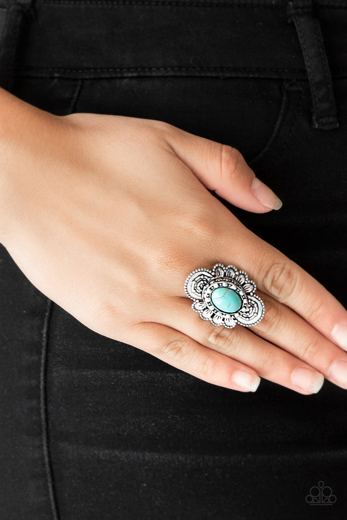Dotted in shimmery patterns, textured silver petals bloom from a refreshing turquoise stone center for a bold seasonal look. Features a stretchy band for a flexible fit.  Sold as one individual ring.  Always nickel and lead free.