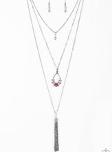 Load image into Gallery viewer, A solitaire pink pearl swings from the uppermost chain, giving way to a teardrop pendant and shimmery silver chain tassel. Dainty white rhinestones and pink pearls collect at the bottom of the centermost pendant for a glamorous finish. Features an adjustable clasp closure.  Sold as one individual necklace. Includes one pair of matching earrings.  Always nickel and lead free.