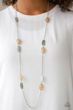 Load image into Gallery viewer, Featuring an opaque finish, glassy brown beads join hammered silver frames along a shimmery silver chain, creating a colorful collision across the chest. Features an adjustable clasp closure.  Sold as one individual necklace. Includes one pair of matching earrings.  Always nickel and lead free.