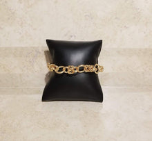 Load image into Gallery viewer,  Adorable bracelet with varying sizes of gold ringlets. Has an extender/adjustable clasp.  Sold as one individual bracelet.  Always nickel and lead free.  Fashion Fix Exclusive October 2021