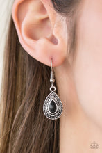 Load image into Gallery viewer, Chiseled into a tranquil teardrop, a neutral black stone is pressed into the center of a silver frame radiating with shimmery sunburst details. Earring attaches to a standard fishhook fitting.  Sold as one pair of earrings.  Always nickel and lead free.