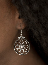 Load image into Gallery viewer, Brushed in an antiqued shimmer, glistening silver bars bend into airy petals. A glittery white rhinestone dots the floral center for a feminine finish. Earring attaches to a standard fishhook fitting.  Sold as one pair of earrings.
