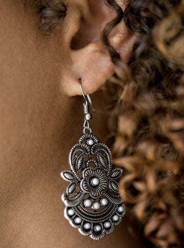 Delicately etched and dotted in tactile textures, leafy silver frames bloom into a summery floral frame. Dainty gray beads dot the seasonal frame for a colorful finish. Earring attaches to a standard fishhook fitting.  Sold as one pair of earrings. 