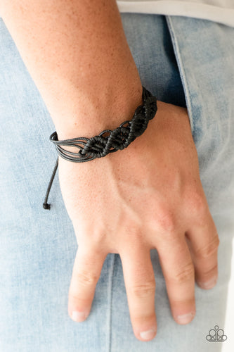 Strands of shiny black cording weaves and braids across the wrist for a rugged, nautical inspired look. Features an adjustable sliding knot closure.  Sold as one individual bracelet.  Always nickel and lead free.
