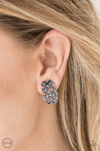 Brushed in an antiqued shimmer, rope-like silver bars weave into a tactile frame. Earring attaches to a standard clip-on fitting.  Sold as one pair of clip-on earrings.    Always nickel and lead free.