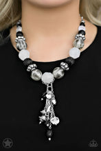 Load image into Gallery viewer, Smooth beads with a marbleized black and white swirl alternate with milky white and silver accents. A tassel of chains in various lengths is decorated with black, silver, and frosty pieces. Features an adjustable clasp closure.  Sold as one individual necklace. Includes one pair of matching earrings.  Always nickel and lead free.  Blockbuster!