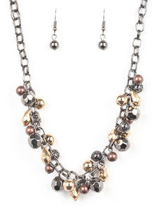 Necklace and Earrings:  Featuring shiny, faceted, and mesh finishes, mismatched copper, gold, and gunmetal beads trickle below the collar for an edgy industrial look. Features an adjustable clasp closure.  Bracelet:  Featuring shiny, faceted, and mesh finishes, mismatched copper, gold, and gunmetal beads trickle from the wrist for an edgy industrial look. Features an adjustable clasp closure.  Sold as one individual necklace, earrings, and bracelet.