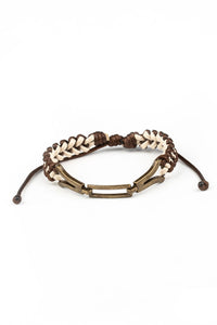 Braided strands of brown and white twine-like cording knot around interlocking brass frames, creating an edgy urban centerpiece around the wrist. Features an adjustable sliding knot closure.  Sold as one individual bracelet.