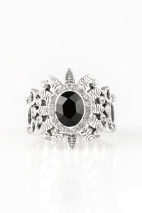 Ringed in glittery white rhinestones, a sparkling black gem is pressed into the center of a leafy silver frame. Dainty white rhinestones are sprinkled along the shimmery foliage for a refined finish. Features a stretchy band for a flexible fit.  Sold as one individual ring.