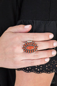Vivacious orange stones are pressed into a studded silver frame, coalescing into a whimsical floral centerpiece atop the finger. Features a stretchy band for a flexible fit.  Sold as one individual ring.  Always nickel and lead free.