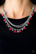 Load image into Gallery viewer, Infused with layers of mismatched silver chains, fiery red rock beading and faceted silver beading trickle from a shimmery silver chain, creating an earthy fringe below the collar. Features an adjustable clasp closure.  Sold as one individual necklace. Includes one pair of matching earrings.  Always nickel and lead free.