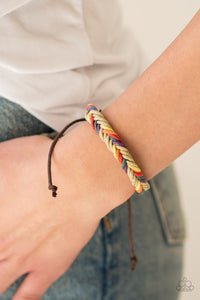 Brown and multicolored twine weave around the wrist, creating a colorful braid. Features an adjustable sliding knot closure.  Sold as one individual bracelet.  Always nickel and lead free.