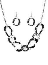 Load image into Gallery viewer, Brushed in a high-sheen finish, warped gunmetal links connect below the collar for an edgy statement. Features an adjustable clasp closure.  Sold as one individual necklace. Includes one pair of matching earrings.  