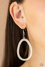 Load image into Gallery viewer, Brushed in a high-sheen finish, a silver oval frame swings from the ear for a casual fashion. Earring attaches to a standard fishhook fitting  Sold as one pair of earrings.  Always nickel and lead free..
