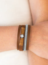 Load image into Gallery viewer, ﻿Brown leather strands layer across the wrist. Infused with silver chain and white rhinestone accents, brown cording knots around a leather strand, securing a solitaire white rhinestone in place for a whimsical finish. Features an adjustable clasp closure.  Sold as one individual bracelet.