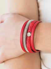 Load image into Gallery viewer, Red leather strands layer across the wrist. Infused with silver chain and white rhinestone accents, red cording knots around a leather strand, securing a solitaire white rhinestone in place for a whimsical finish. Features an adjustable clasp closure.  Sold as one individual bracelet.